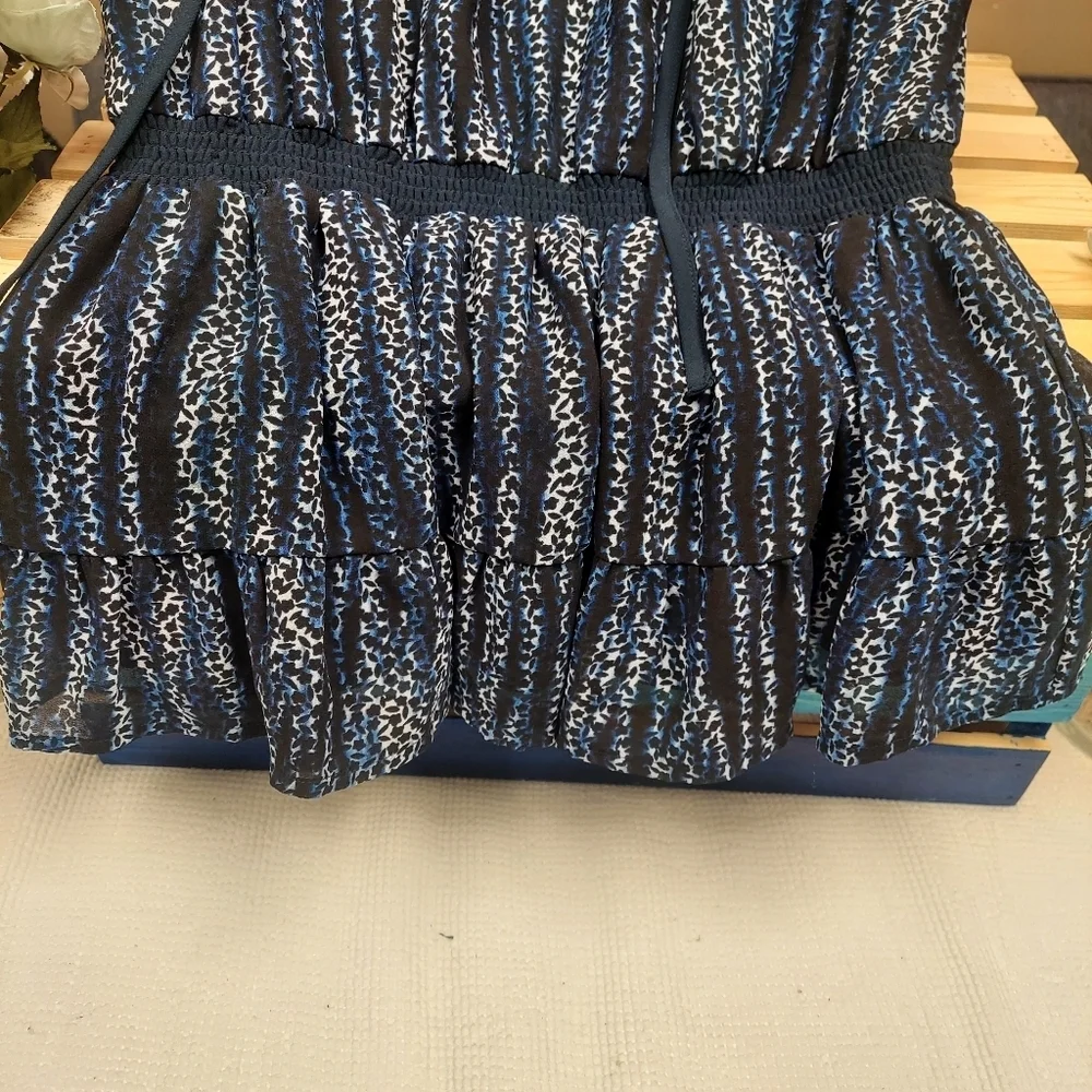 Michael Kors Women's Animal Print Peplum Top Elastic around waist Size Large